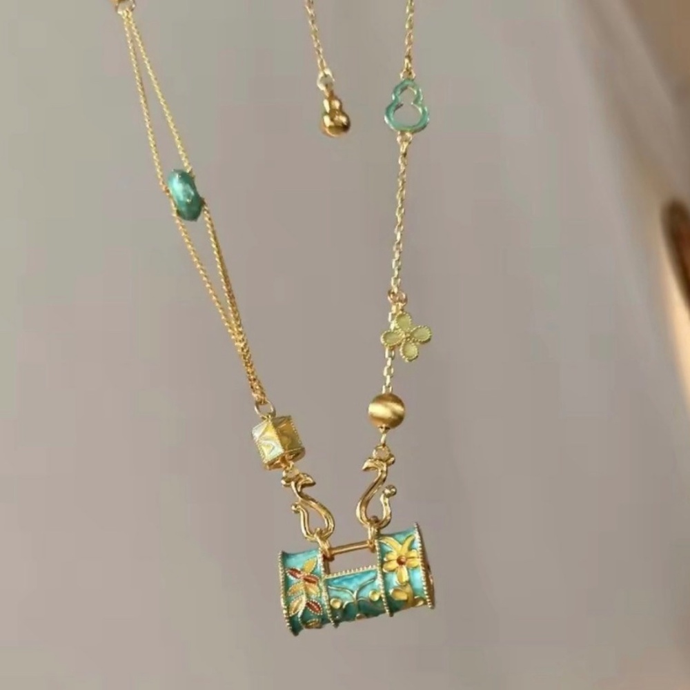 vintage gold necklace with teal charm/pendant retro